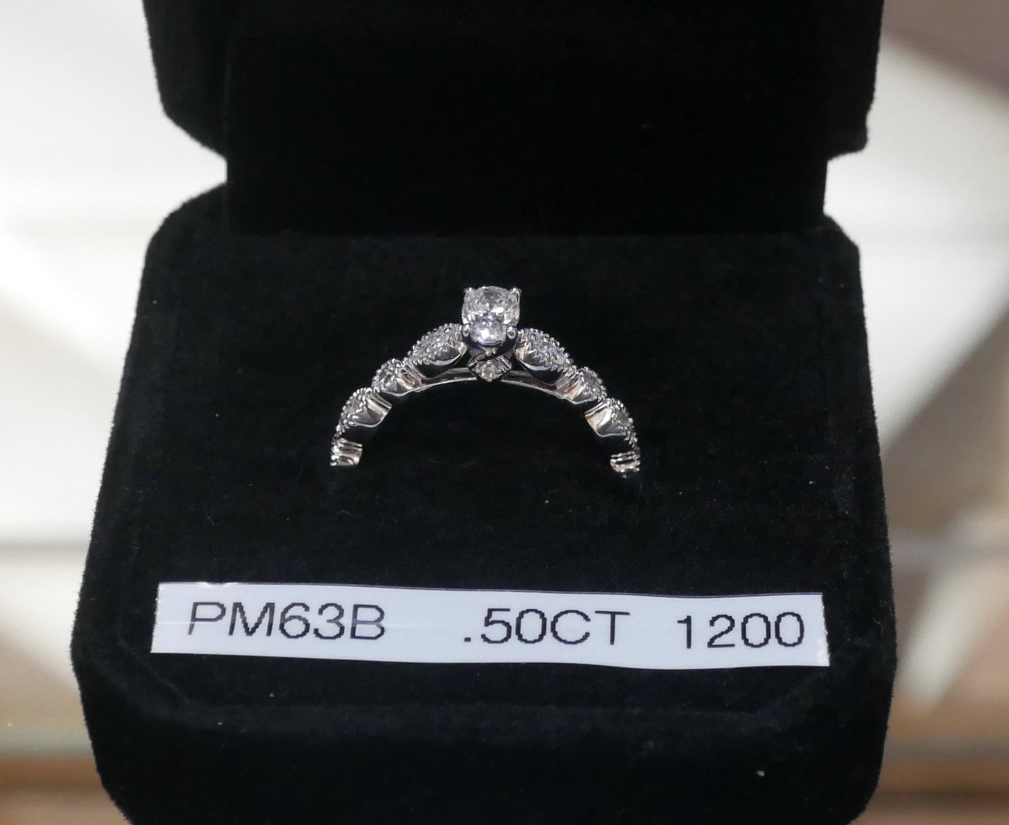 Ornate Diamond Ring with Decorative Band